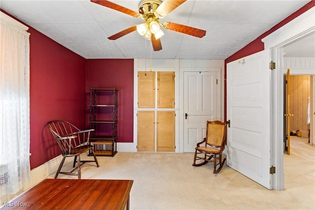 811 E High Ave, New Philadelphia, OH 44663 - living area with carpet floors and ceiling fan