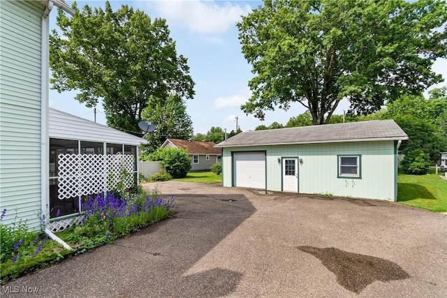 811 E High Ave, New Philadelphia, OH 44663 - detached garage with asphalt driveway