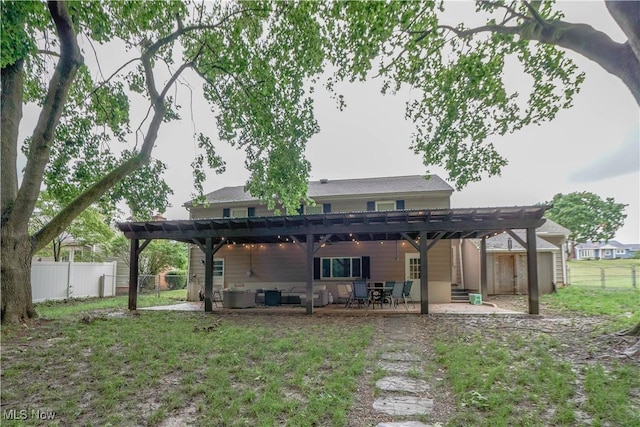 1324 Woodrow St NW, North Canton, OH 44720 - rear view of house featuring a pergola and a patio area