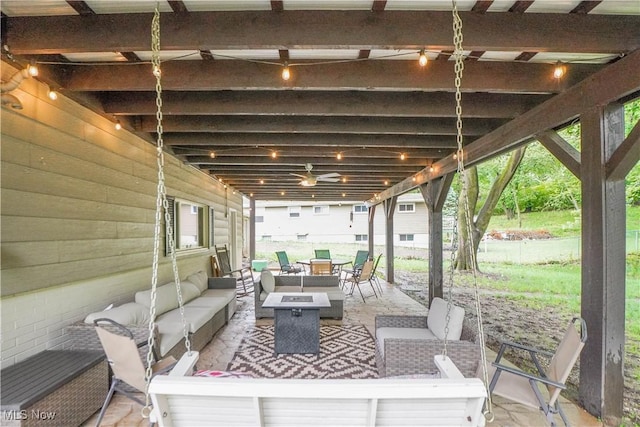 1324 Woodrow St NW, North Canton, OH 44720 - view of patio / terrace with an outdoor living space with a fire pit