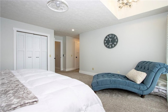 13946 Highview Dr, Dalton, OH 44618 - bedroom with light carpet, a closet, recessed lighting, and a textured ceiling