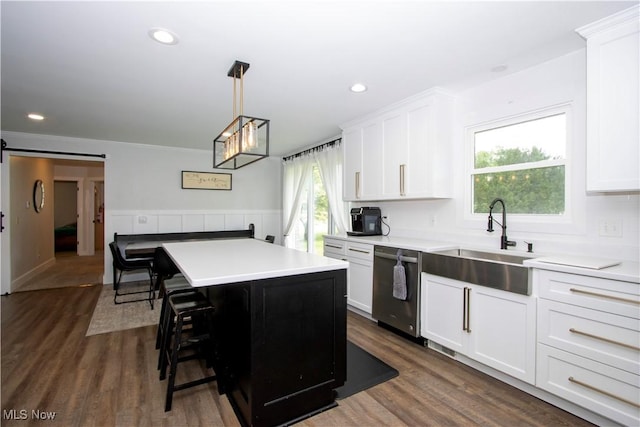 13946 Highview Dr, Dalton, OH 44618 - kitchen featuring stainless steel dishwasher, white cabinetry, a center island, plenty of natural light, and recessed lighting