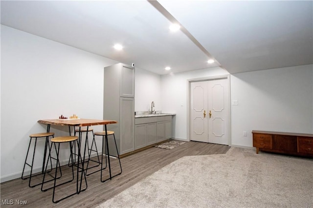 13946 Highview Dr, Dalton, OH 44618 - bar featuring light wood-type flooring and recessed lighting