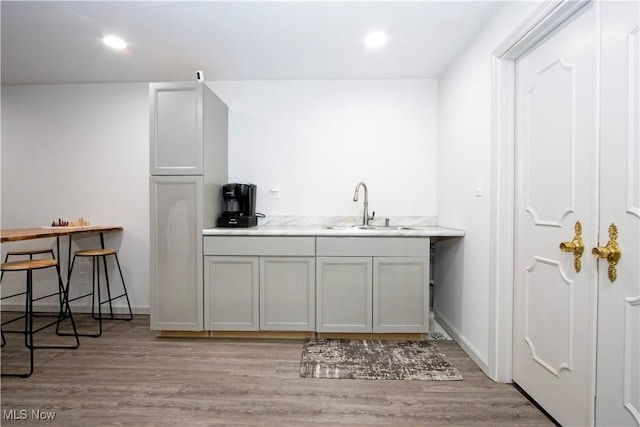 13946 Highview Dr, Dalton, OH 44618 - kitchen with light wood-style floors, light countertops, and recessed lighting