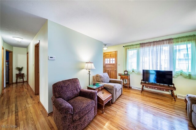 30888 Harrison Rd, Wickliffe, OH 44092 - living area featuring wood finished floors and baseboards