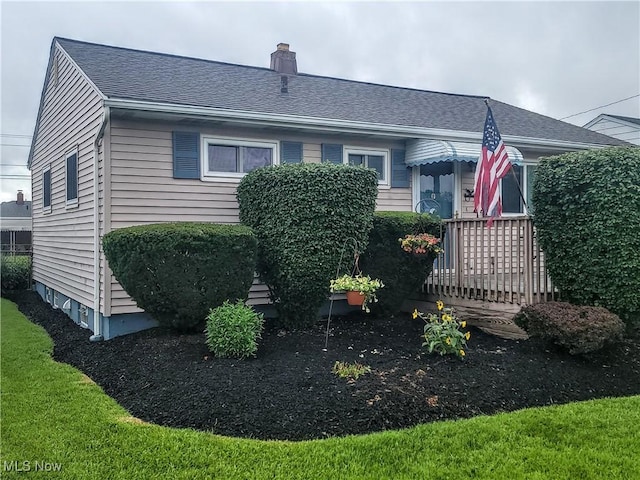 5752 Van Wert Ave, Brook Park, OH 44142 - view of front of property with a chimney and a shingled roof
