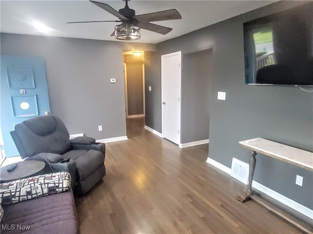 5752 Van Wert Ave, Brook Park, OH 44142 - sitting room with a ceiling fan and wood finished floors