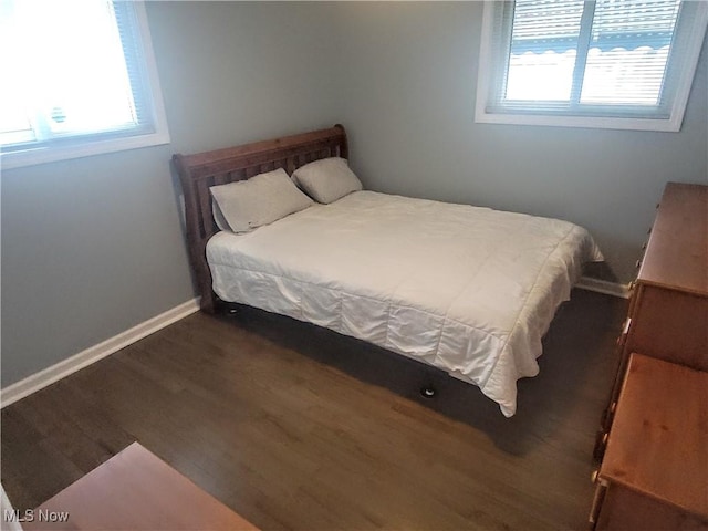 5752 Van Wert Ave, Brook Park, OH 44142 - bedroom with wood finished floors and baseboards