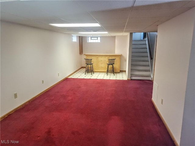 5752 Van Wert Ave, Brook Park, OH 44142 - below grade area featuring a dry bar, carpet floors, stairway, and a drop ceiling