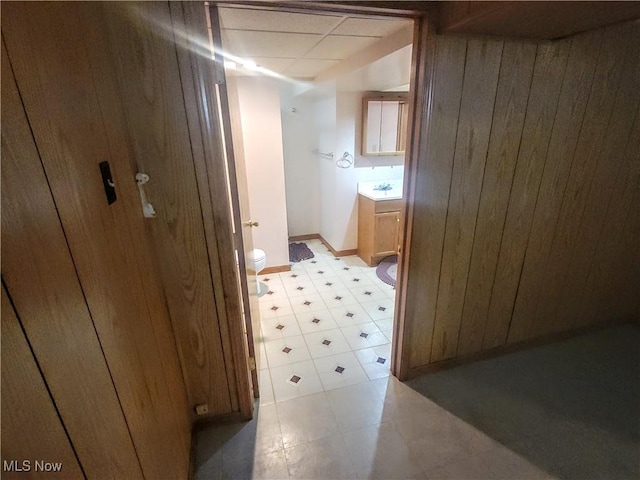 5752 Van Wert Ave, Brook Park, OH 44142 - corridor featuring wood walls and light floors
