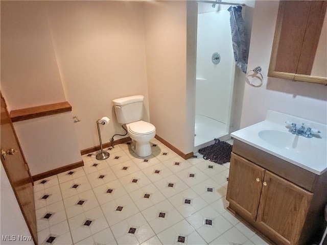5752 Van Wert Ave, Brook Park, OH 44142 - full bathroom featuring vanity, a stall shower, and tile patterned flooring
