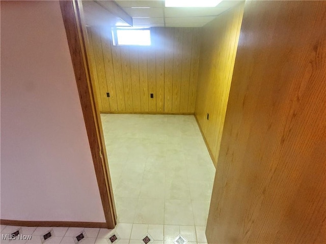 5752 Van Wert Ave, Brook Park, OH 44142 - basement featuring wood walls and light floors