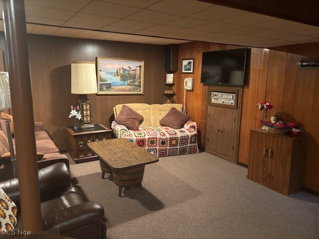 1527 Difford, Niles, OH 44446 - carpeted living area with wooden walls and a drop ceiling