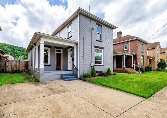 719 N 3rd St, Toronto, OH 43964 - view of front of property featuring a porch and brick siding