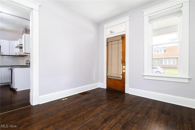 719 N 3rd St, Toronto, OH 43964 - unfurnished room with dark wood-style flooring