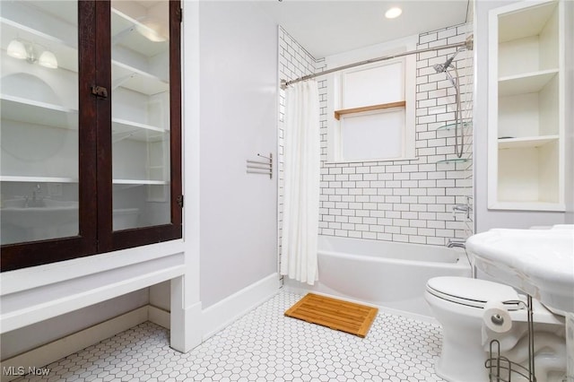 719 N 3rd St, Toronto, OH 43964 - bathroom featuring shower / bathtub combination with curtain and tile patterned floors