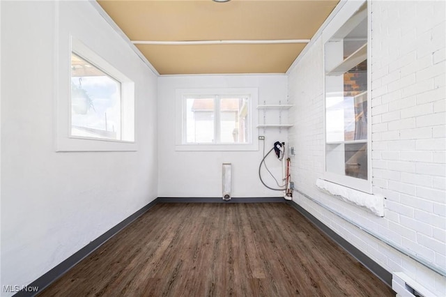 719 N 3rd St, Toronto, OH 43964 - washroom featuring dark wood finished floors and baseboards