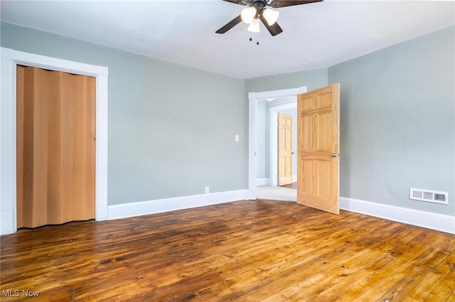 719 N 3rd St, Toronto, OH 43964 - unfurnished bedroom featuring wood finished floors and a ceiling fan