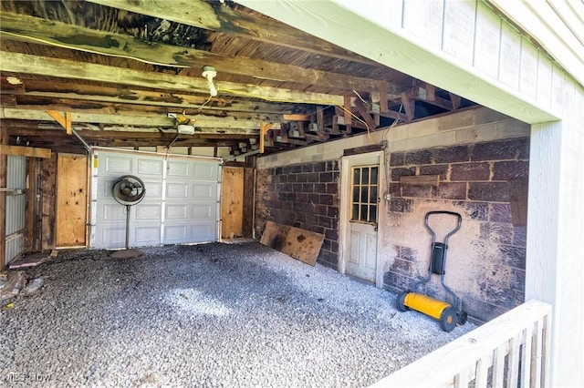 719 N 3rd St, Toronto, OH 43964 - garage featuring a garage door opener