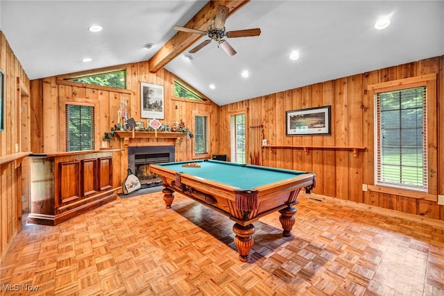 12938 Carter Rd, Leroy, OH 44077 - playroom with wooden walls, ceiling fan, a lit fireplace, plenty of natural light, and billiards table