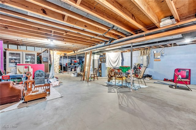 12938 Carter Rd, Leroy, OH 44077 - unfinished below grade area featuring gas water heater and electric panel