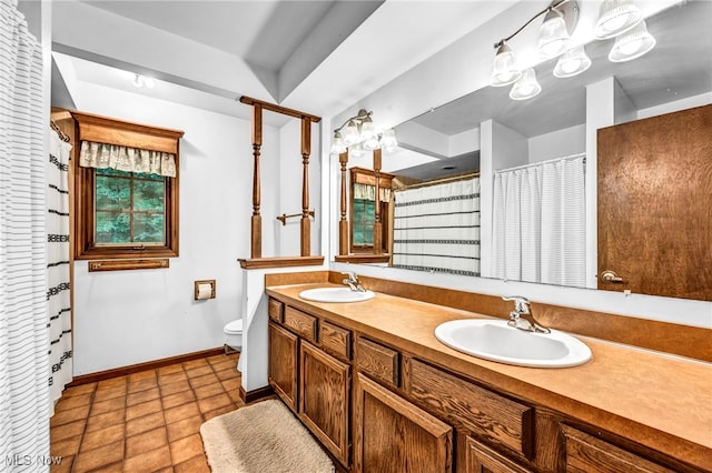 12938 Carter Rd, Leroy, OH 44077 - full bath with double vanity, a shower with shower curtain, and tile patterned floors