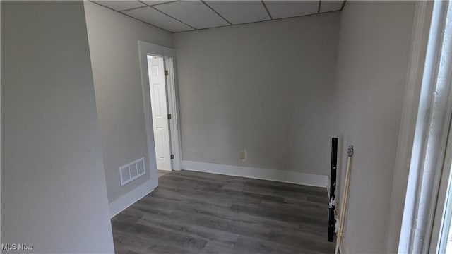 1111 2nd St NW, Canton, OH 44703 - unfurnished room with a drop ceiling and wood finished floors