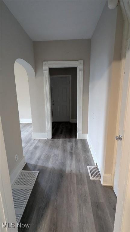 1111 2nd St NW, Canton, OH 44703 - hallway with wood finished floors and arched walkways