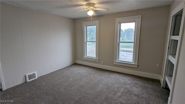 1111 2nd St NW, Canton, OH 44703 - carpeted spare room with a ceiling fan