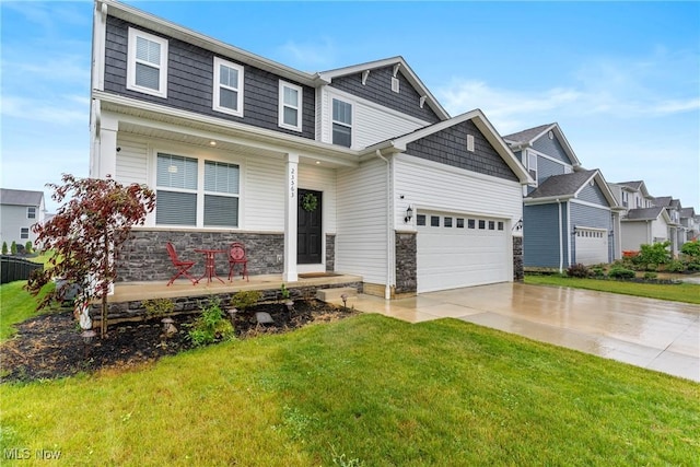 23563 Rebecca Ln, Columbia Station, OH 44028 - view of front of property with stone siding, concrete driveway, a front lawn, covered porch, and a garage
