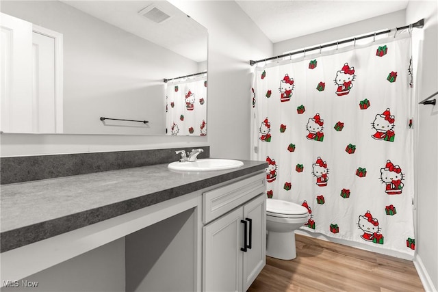 23563 Rebecca Ln, Columbia Station, OH 44028 - bathroom featuring vanity, wood finished floors, and curtained shower
