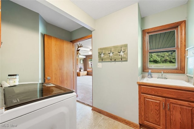 2896 Highview Cir NW, Dellroy, OH 44620 - bathroom featuring washer / clothes dryer and vanity