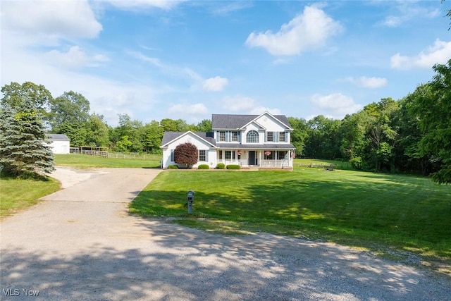 2896 Highview Cir NW, Dellroy, OH 44620 - colonial home with concrete driveway and a porch