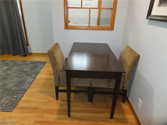 13621 Bellbrook Dr, Brook Park, OH 44142 - dining space featuring wood finished floors and baseboards