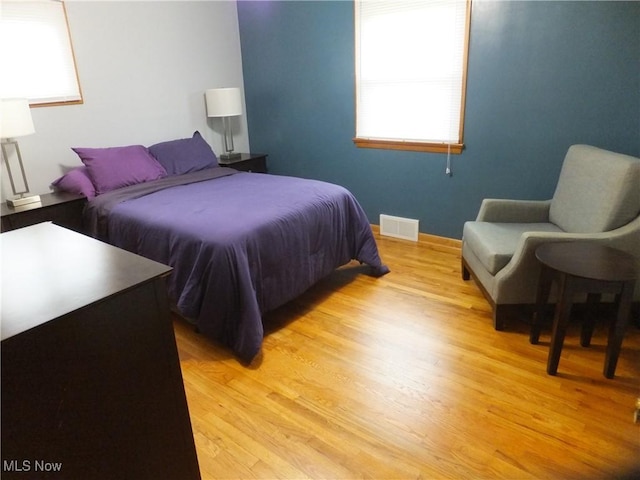 13621 Bellbrook Dr, Brook Park, OH 44142 - bedroom featuring light wood-type flooring