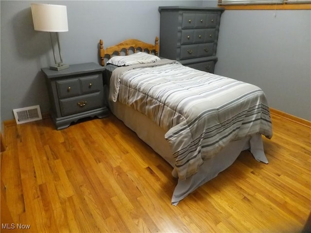 13621 Bellbrook Dr, Brook Park, OH 44142 - bedroom featuring light wood-type flooring