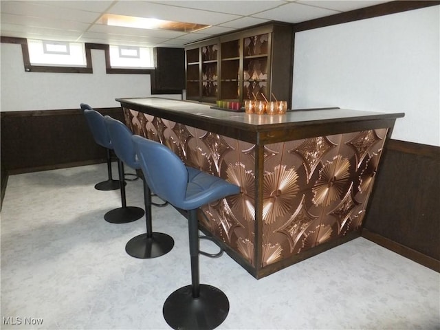13621 Bellbrook Dr, Brook Park, OH 44142 - indoor dry bar with a drop ceiling and carpet floors