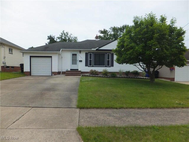 13621 Bellbrook Dr, Brook Park, OH 44142 - ranch-style house featuring a garage, driveway, a front lawn, and a shingled roof