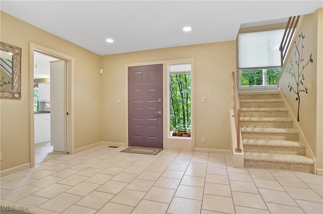 80 Hawthorne Ave, Rittman, OH 44270 - entrance foyer with stairs, recessed lighting, and light tile patterned flooring