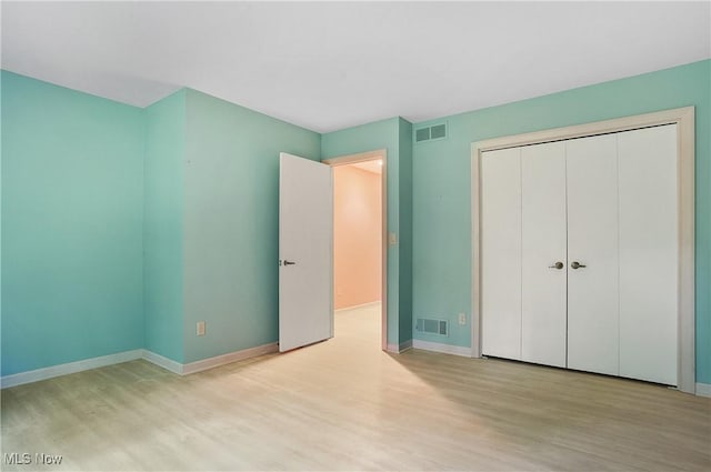 80 Hawthorne Ave, Rittman, OH 44270 - unfurnished bedroom featuring wood finished floors and a closet