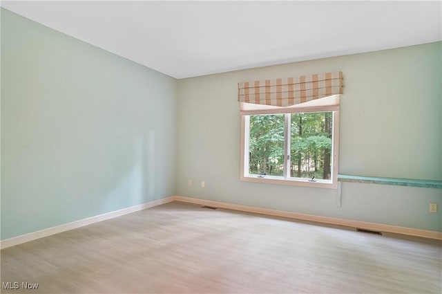 80 Hawthorne Ave, Rittman, OH 44270 - unfurnished room featuring wood finished floors and baseboards