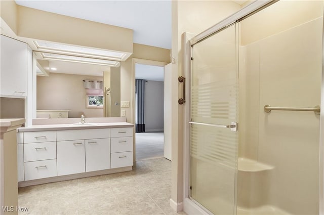 80 Hawthorne Ave, Rittman, OH 44270 - bathroom featuring a stall shower, tile patterned floors, and vanity