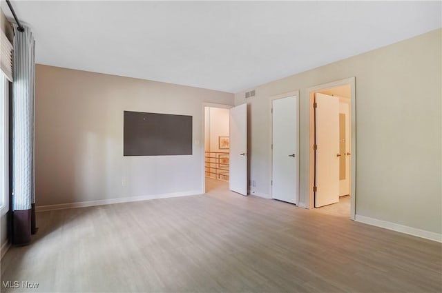 80 Hawthorne Ave, Rittman, OH 44270 - unfurnished bedroom with wood finished floors and ensuite bathroom