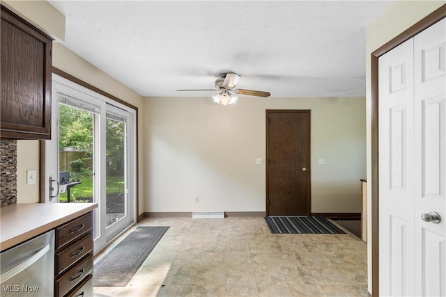 8132 Arlington Ave NW, North Canton, OH 44720 - kitchen with dark brown cabinets, stainless steel dishwasher, ceiling fan, and light countertops