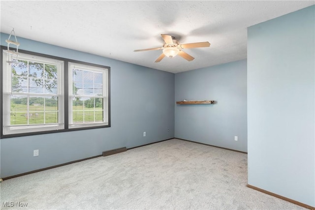 8132 Arlington Ave NW, North Canton, OH 44720 - spare room featuring carpet and a ceiling fan
