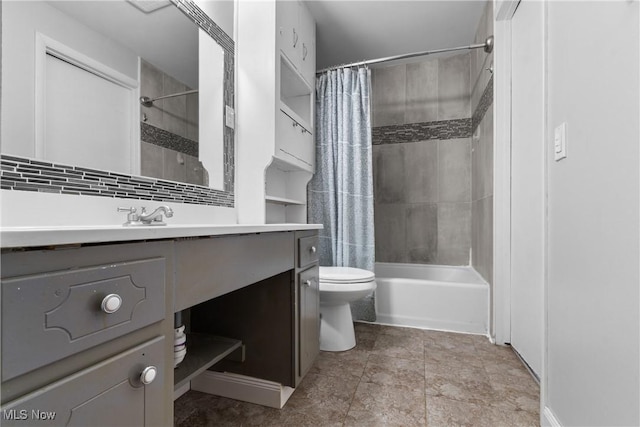 8132 Arlington Ave NW, North Canton, OH 44720 - bathroom with vanity, shower / bath combo with shower curtain, and tasteful backsplash