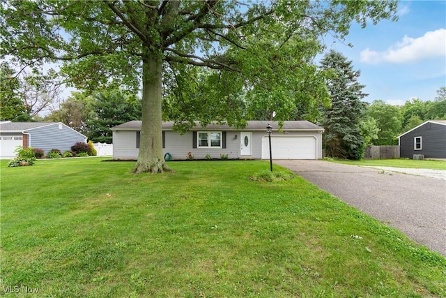 8132 Arlington Ave NW, North Canton, OH 44720 - view of front of home with asphalt driveway and an attached garage