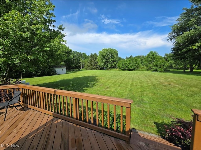 16535 Hosmer Rd, Middlefield, OH 44062 - wooden terrace featuring a lawn and an outdoor structure