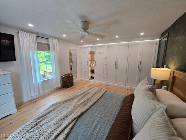 16535 Hosmer Rd, Middlefield, OH 44062 - bedroom with light wood-type flooring, recessed lighting, and ceiling fan