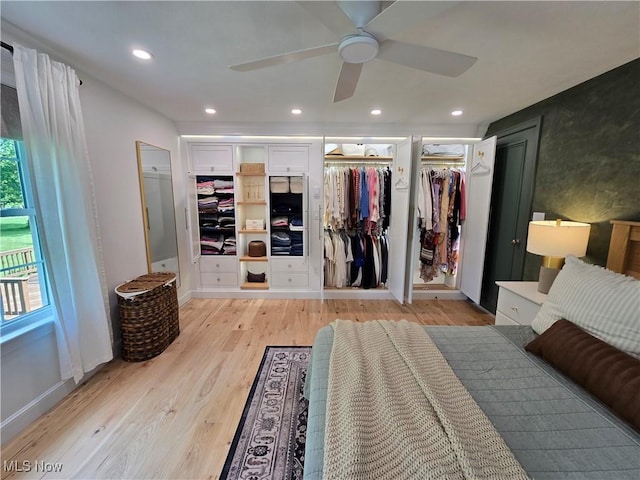 16535 Hosmer Rd, Middlefield, OH 44062 - bedroom featuring light wood-style flooring, two closets, recessed lighting, and a ceiling fan